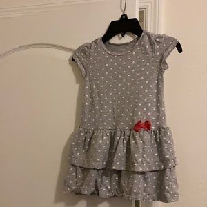 Carter’s Little Girls Gray Dress with Heart Designs.